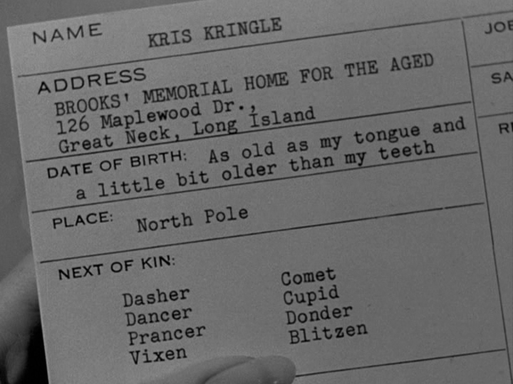 Close-up of Kris's employment card