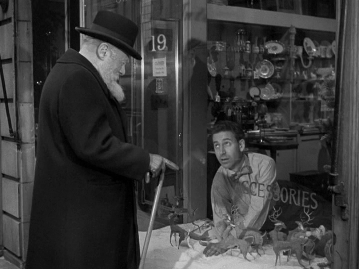 Dressing a holiday window display, part three