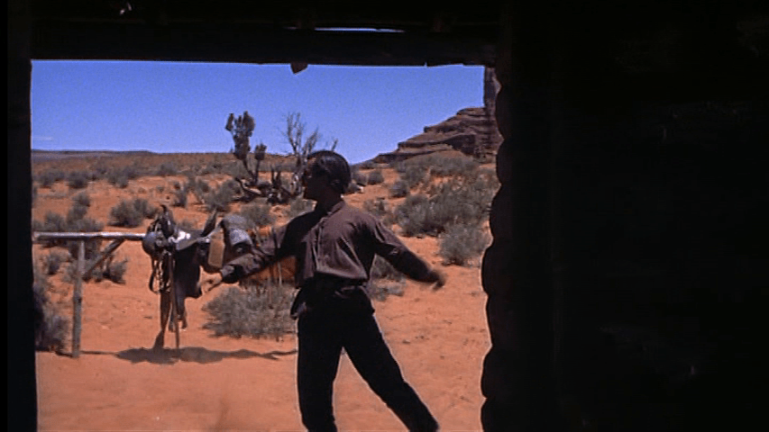 Martin prepares to enter the house after dismounting