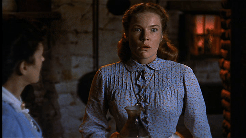 The camera tracks toward Lucy at the moment she understands what's going on