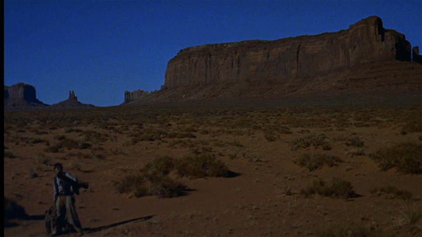 Extreme long shot of Marty with his saddle, but no horse