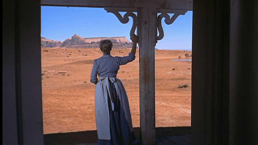 Mrs. Jorgensen framed in a doorway that echoes the film's opening