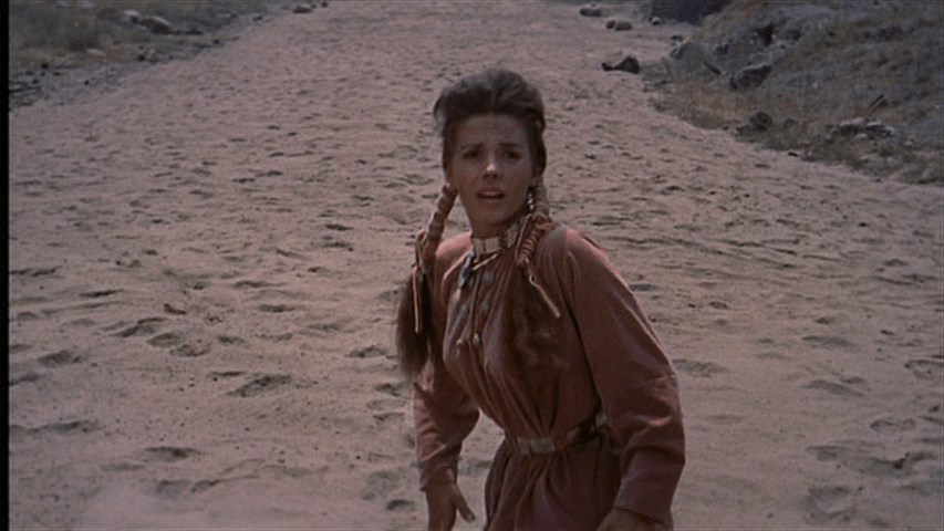 Medium shot of Debbie looking terrified