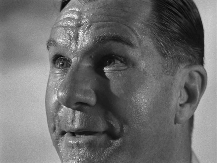 Close-up of Grisby's face