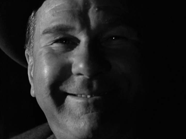 Chiaroscuro close-up of Grisby