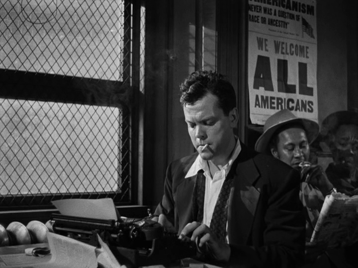 Michael at work at a typewriter