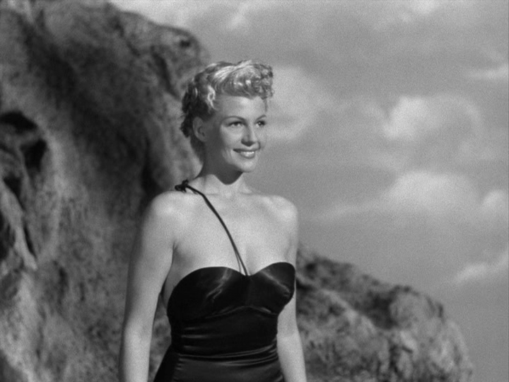 Medium shot of Elsa Bannister in a bathing suit