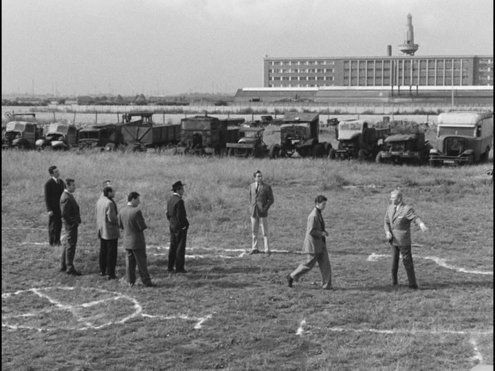 Bob directs a member of his crew to the spot on the outline of the casino where he is supposed to stand during the robbery
