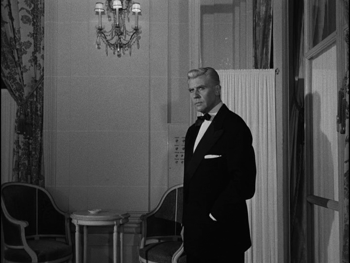 Medium shot of Bob entering the "private room"