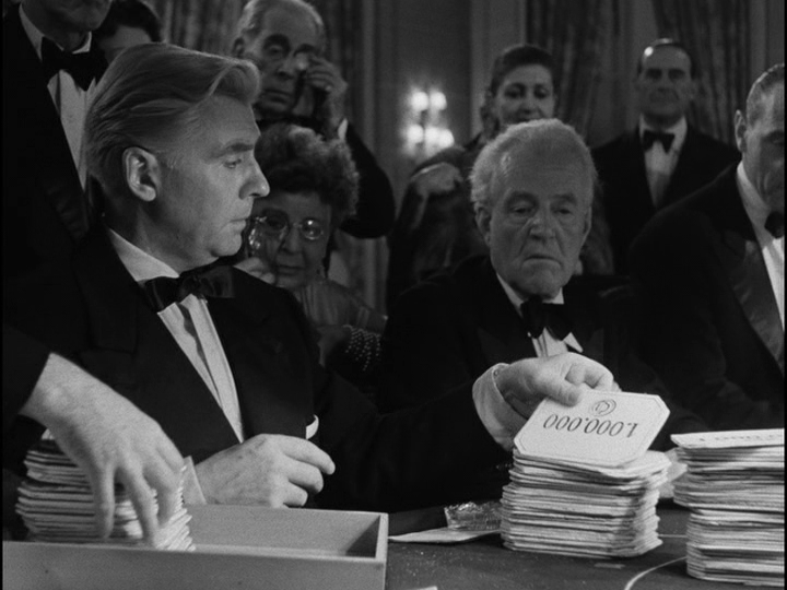 Bob picks up a 1 million franc chip to tip the croupier