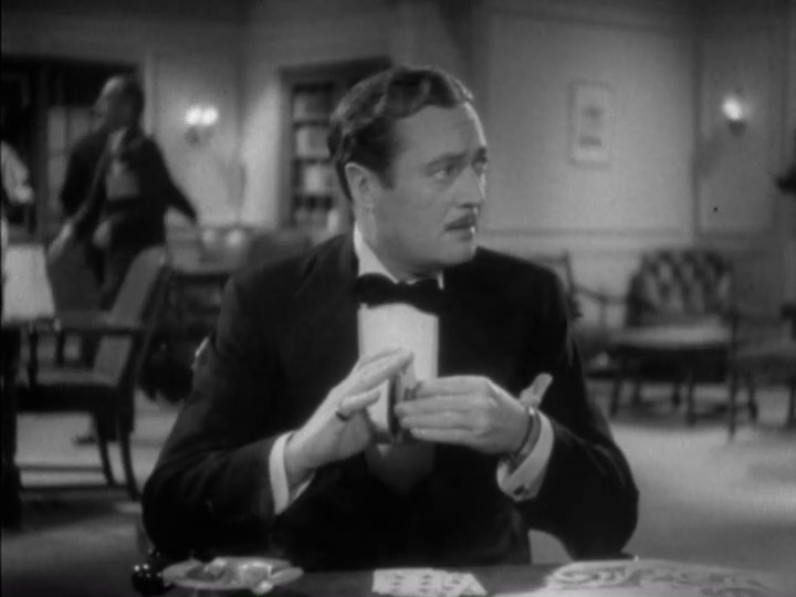 Medium shot of Dugan looking stage left