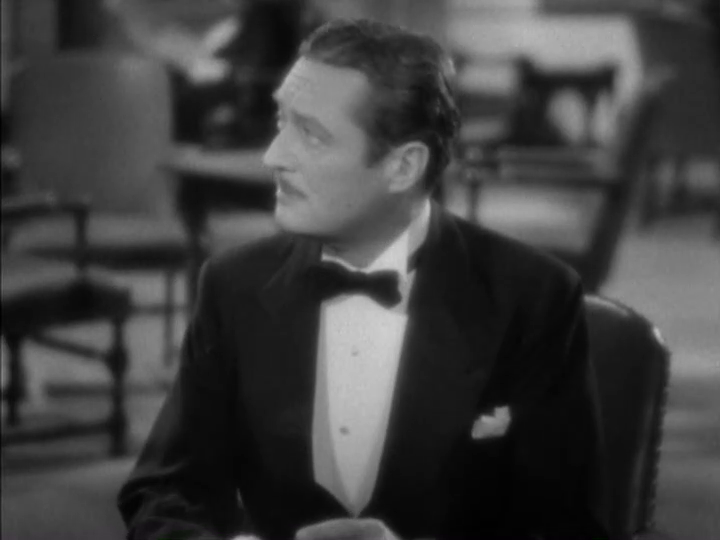 Medium shot of Dugan looking up and stage right