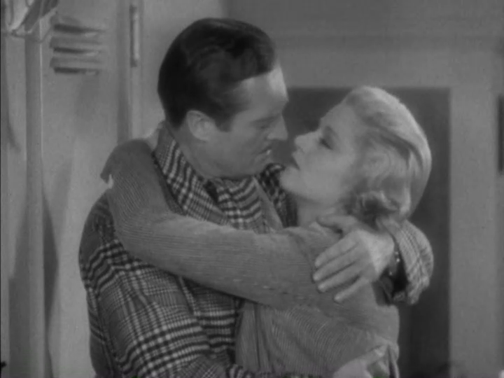 Medium shot of Dugan and Foster leaning in for a kiss . . .