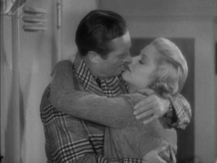 Medium shot of Dugan and Foster leaning in to each other again