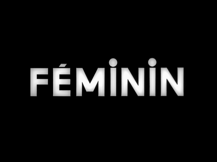 Title card in French which reads "feminine" in white all-caps font against a black background