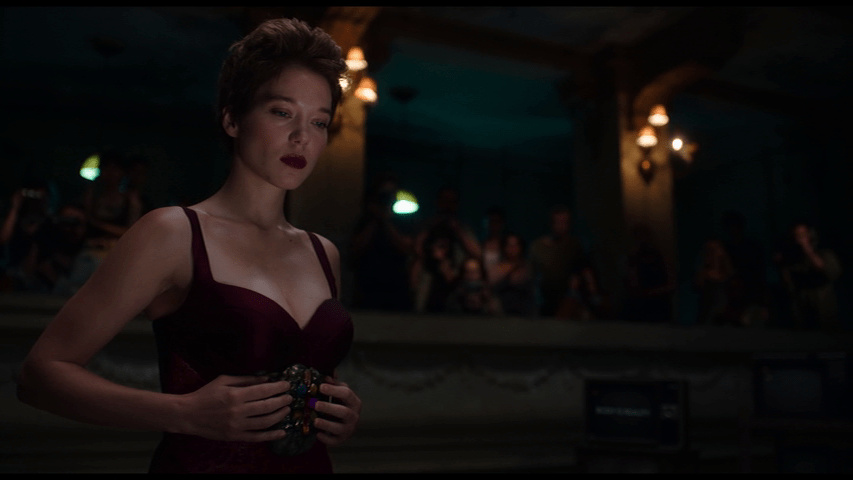 Medium shot of Caprice operating the Sark autopsy module in front of an audience