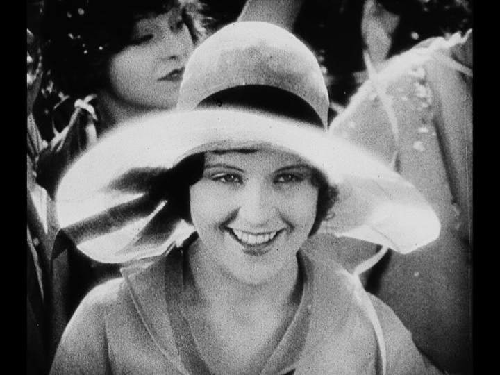 Medium shot of Mary apparently looking at Jim