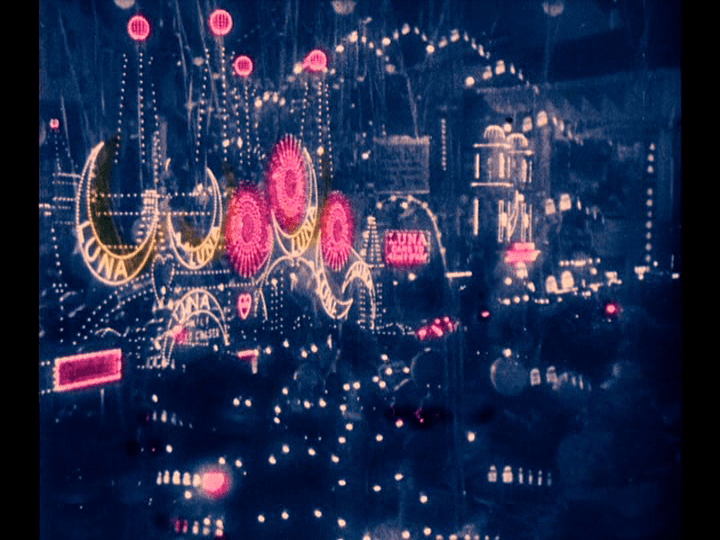 Long shot of the Coney Island boardwalk in a shot that features applied colors