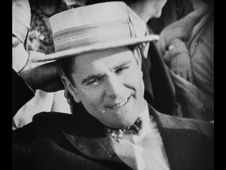 Medium shot of Jim, whose interest has clearly been piqued