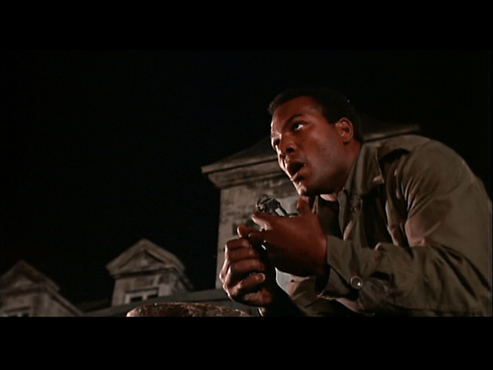 Medium shot of Jefferson preparing to blow up the Nazi officers it is the dozen's mission to assassinate