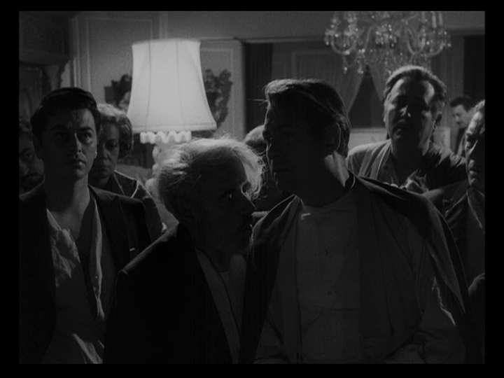 Medium shot of Christian and Alberto Roc reciting "the unpronouncable world"