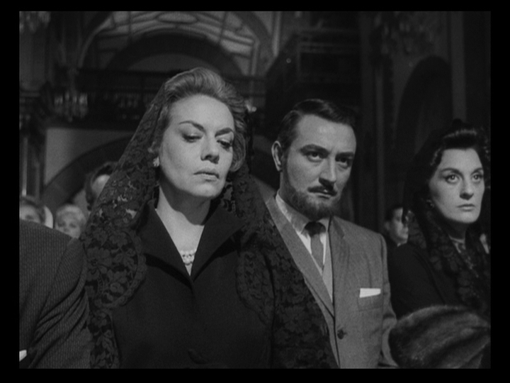 Continuation of the previous shot featuring Edmundo and Lucia