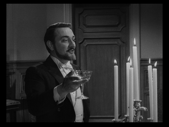 Medium shot of Edmundo giving a toast