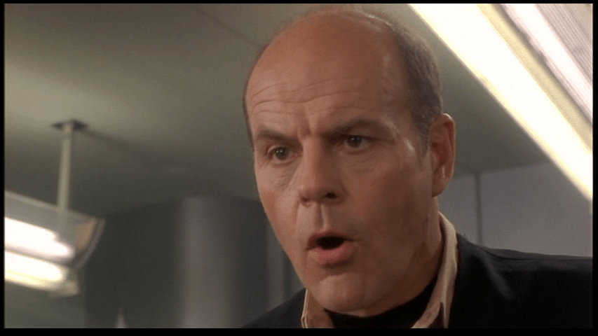 Close-up of Mr. Rasczak telling him to pay attention