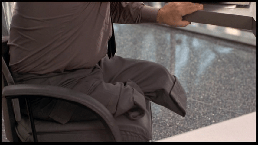 Medium shot of the lower half of the recruiting sergeant's body