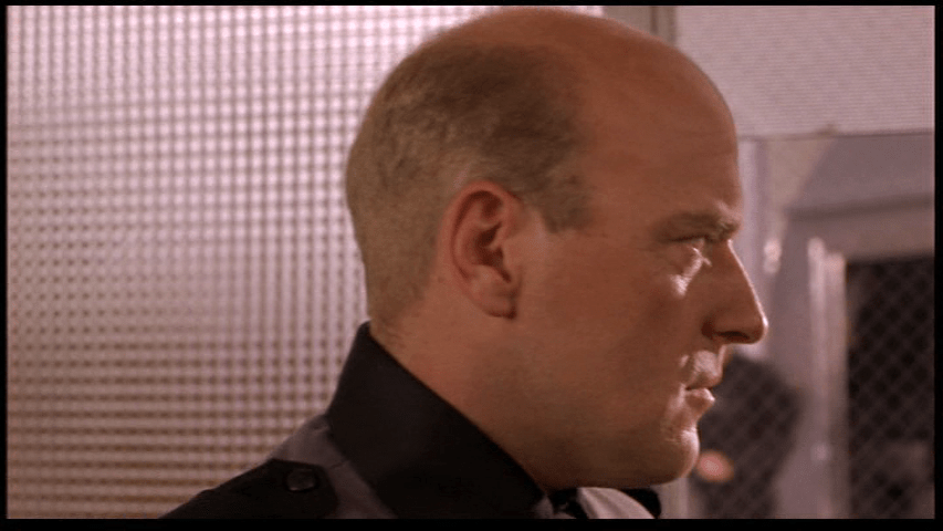 Continuation of the previous shot: the commanding officer turns away