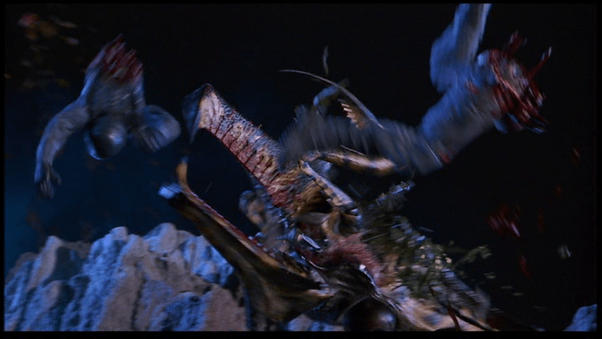 The reporter's torso and legs fly off in different directions