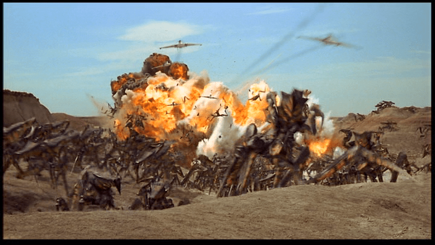 Continuation of the previous shots: the explosions move forward toward the camera