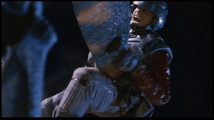 Medium shot of the soldier from the previous image being impaled by a Bug