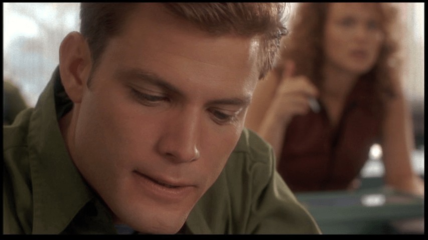 Close-up of Johnny concentrating on a drawing