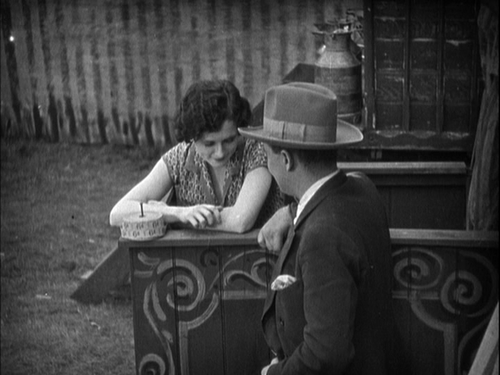 Long shot of Corby flirting with The Girl from the perspective of Sander