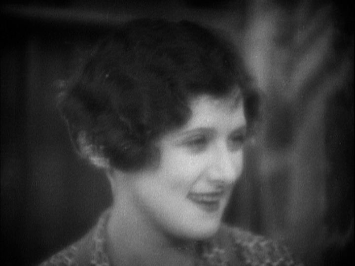 Soft-focus close-up of Mabel smiling