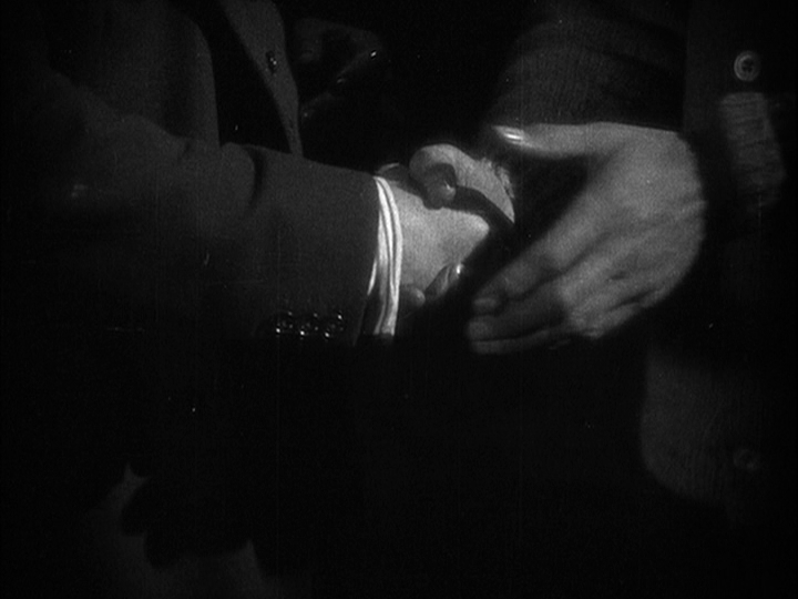 Close-up of the handshake