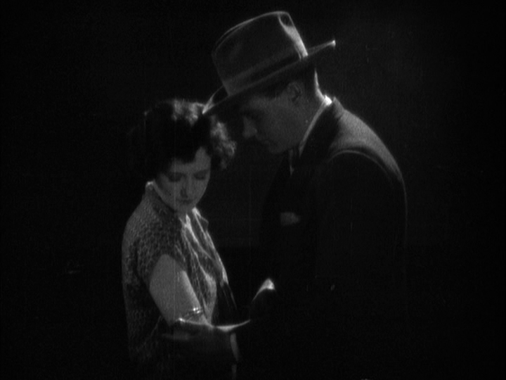 Medium shot of Corby and Mabel with the bracelet