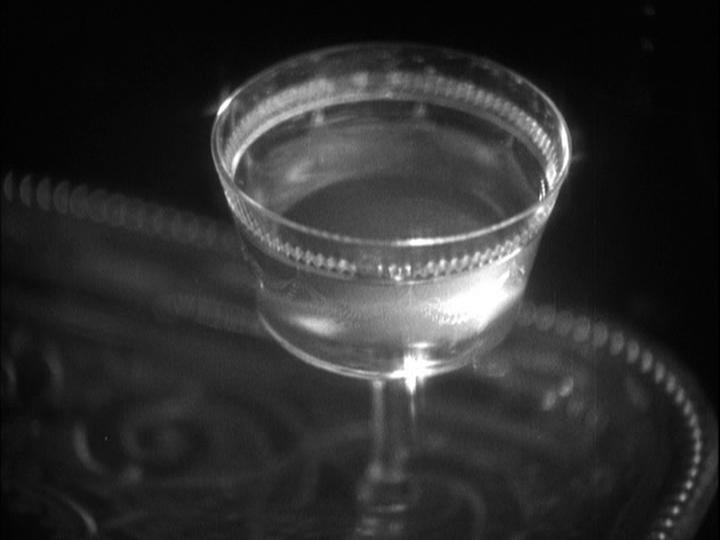 Close-up of a glass of flat champagne