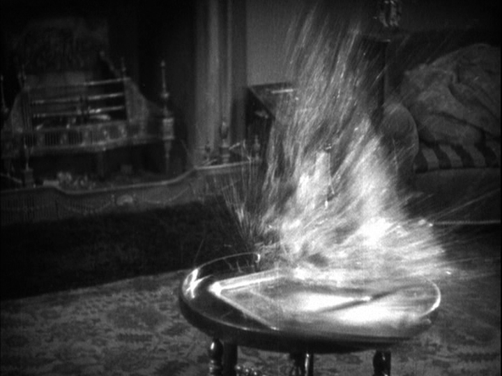 Close-up of the glasses of champagne exploding as the photo crashes into them