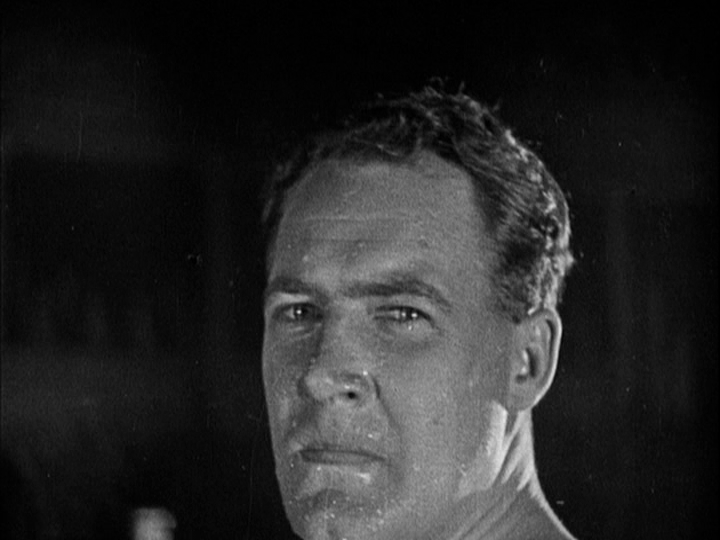 Close-up of Corby's face from Sander's perspective