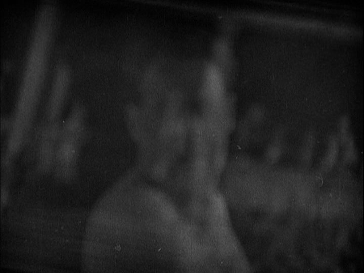 Another shot of Corby's face from Sander's perspective superimposed over the stadium background