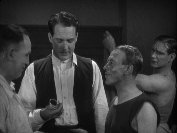 Medium shot of Corby contemplating the armlet