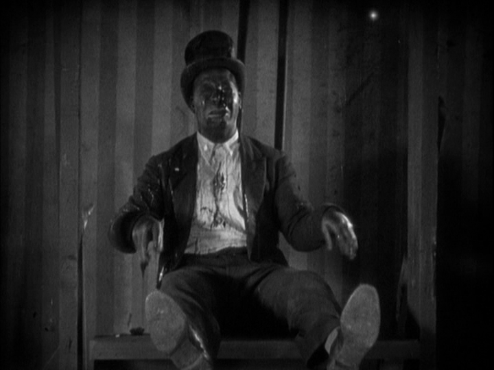 Medium long shot of a man wiping egg of his face