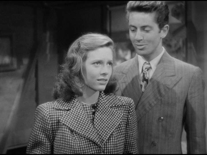 Medium shot of Farley Granger's Bowie consoling Cathy O'Donnell's Keechie