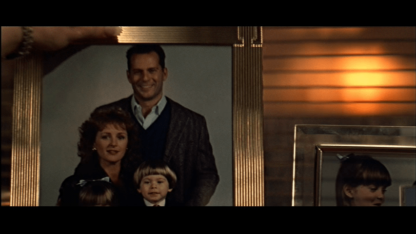 Close-up of Holly grabbing the photo