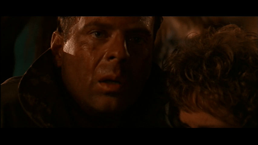 Close-up of McClane looking offscreen to the right