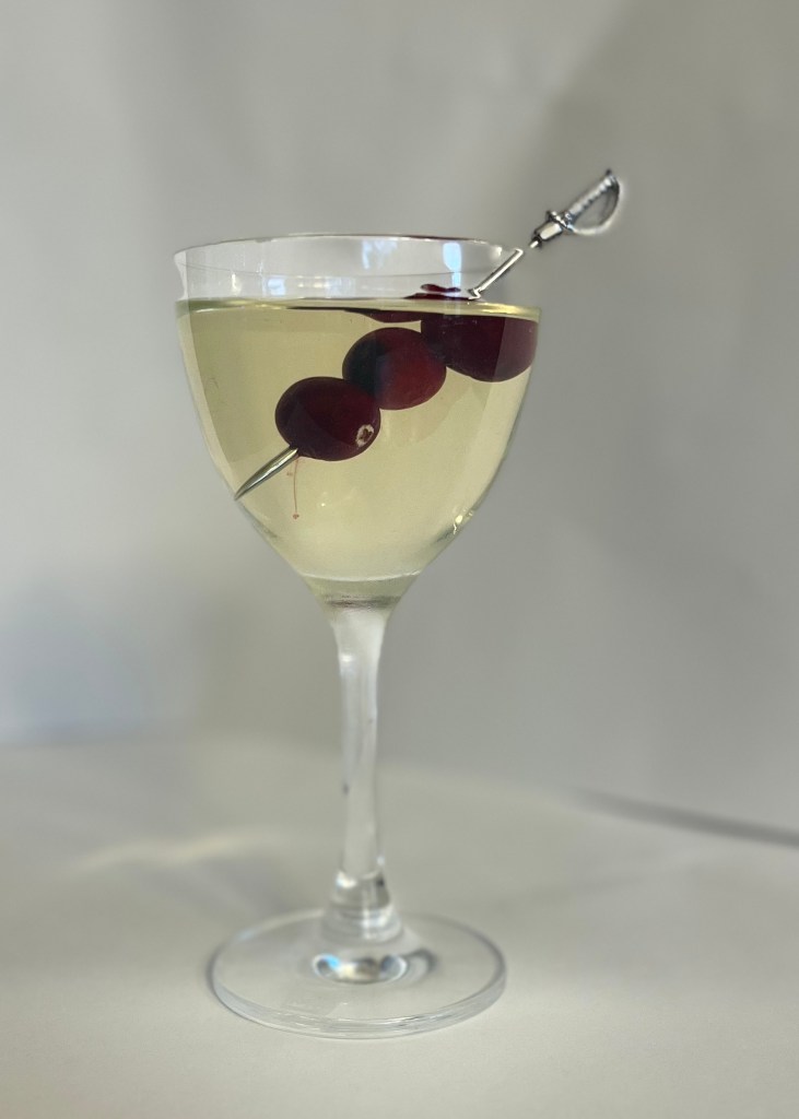 Green + Red Martini in a Nick & Nora glass