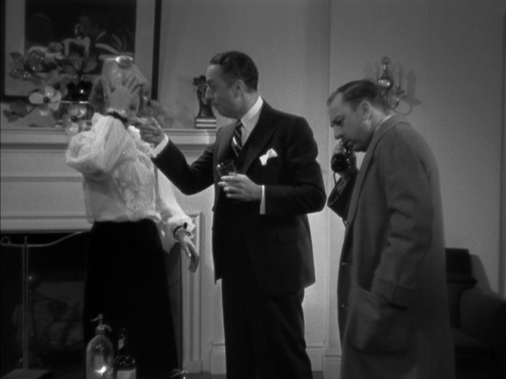 Continuation of the previous image: Nora grabs her face as Nick flicks her nose