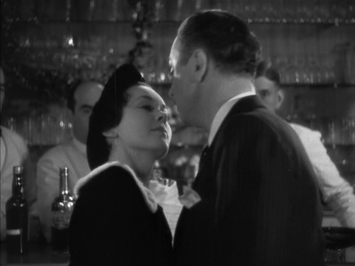 Close-up of Dorothy and Nick looking at each other in the middle of the frame